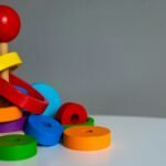 blue green yellow and red plastic toy